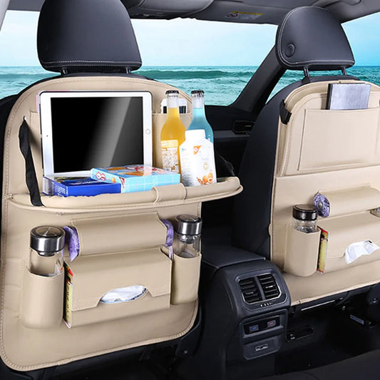 Car seat bag with foldable table organizer showing storage for drinks and a tablet on car seats.